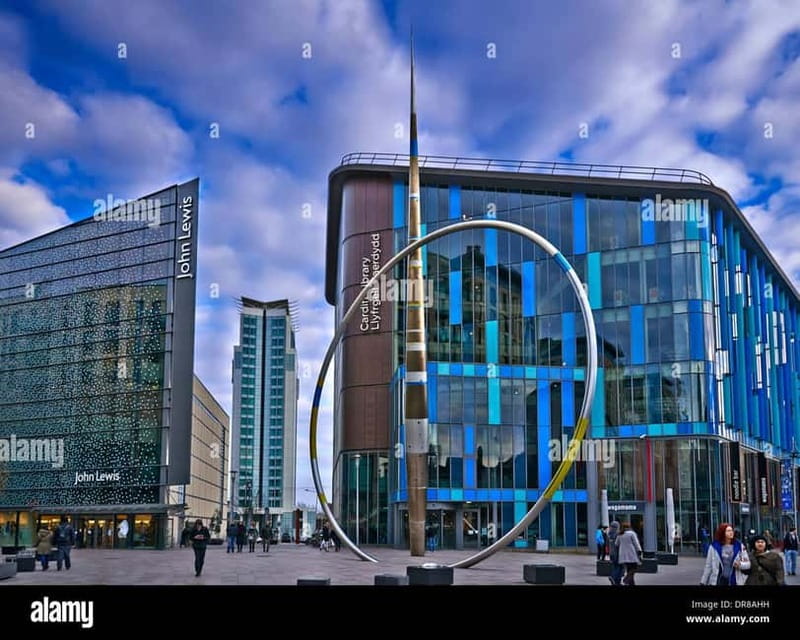 Cardiff: City Highlights Guided Walking Tour - Old center anchors: St John’s Church, Cardiff Market, and the Animal Wall