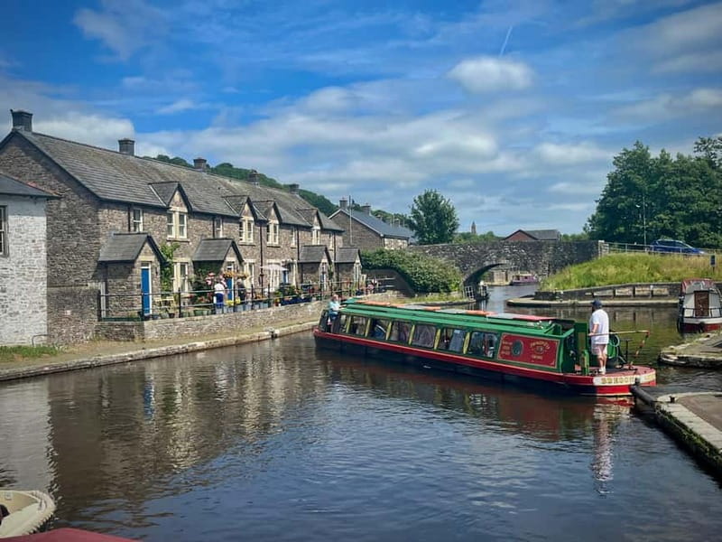 Cardiff: Waterfalls, Mountains & Castles Day Tour - Brecon breaks: canals, independent shops, and a visitor center pause
