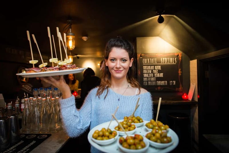 Eating London: Twilight Soho VIP Food & Drinks Tour - Entering Soho’s nightlife zone near the Palace Theatre