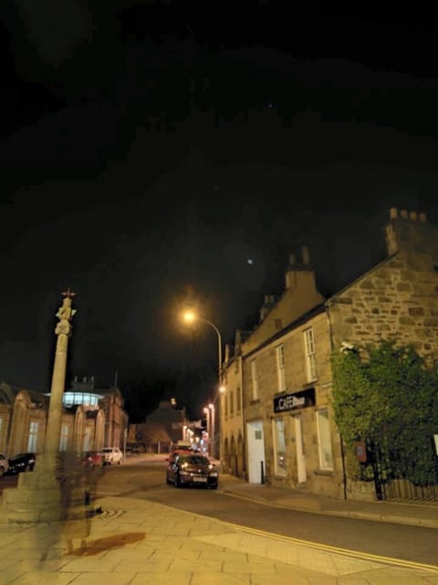 Elgin: High Street Graveyard Walking Tour - Forgotten Graveyard, Poltergeist Fruit Throwing, and Other Reported Oddities