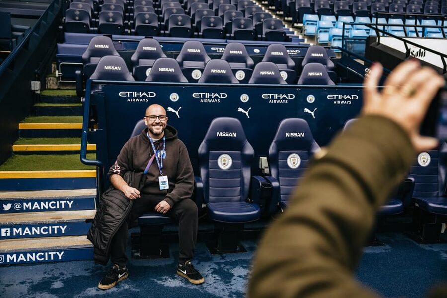 Etihad Stadium: The Manchester City Stadium Tour - Home team dressing room audio-visual show and player shirt selfies
