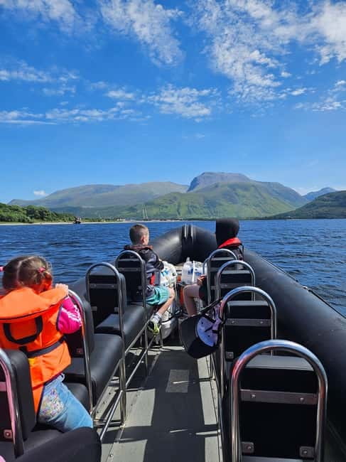 Fort William: Speed Boat Adventure - The Jacobite Steam Train passing by while you are on the water