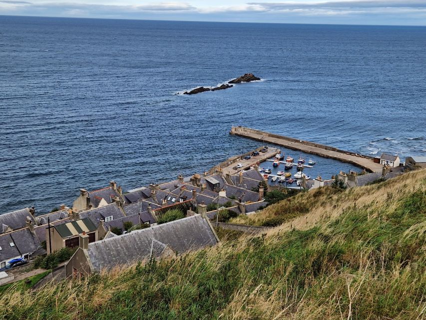 From Aberdeen: Coastal Villages of Aberdeenshire Tour - Pennan: a pebble beach, smart houses, and the Local Hero red telephone box