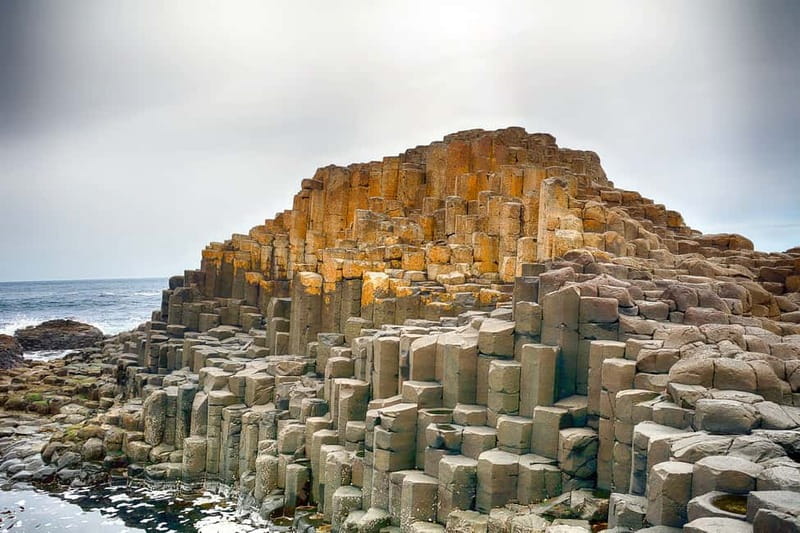 From Belfast: Giant's Causeway & Titanic Experience Belfast - Larrybane Quarry and Dunluce Castle photos through the Stormlands lens