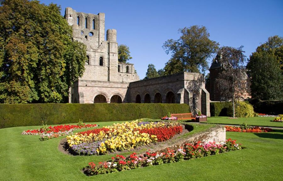 From Edinburgh: Alnwick Castle and Scottish Borders Tour - Kelso: ruined abbey, big market-square energy, and a good reset break