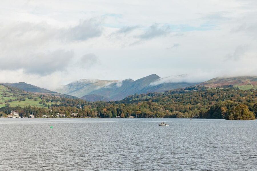 From Manchester: Lake District Bus Tour & Windermere Cruise - Hawkshead: Conservation-Village Charm and Wordsworth’s Grammar School Connection