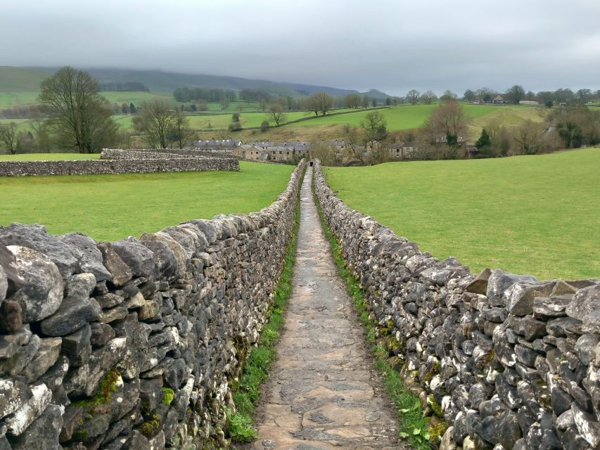 From York: Herriot and Yorkshire Dales Day Trip - Linton Falls: walking the old stone path to meet the guide