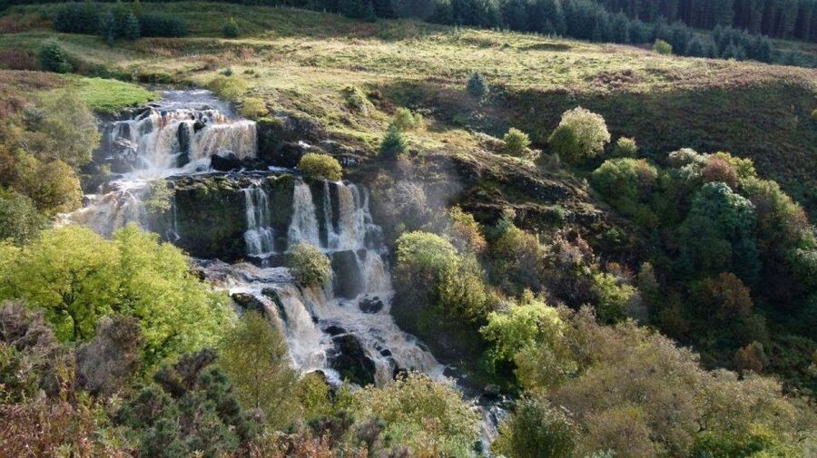 Glasgow: Loup of Fintry Waterfall Guided Tour - Walking into Loup of Fintry: historic footpath, rock formations, and stone bridges