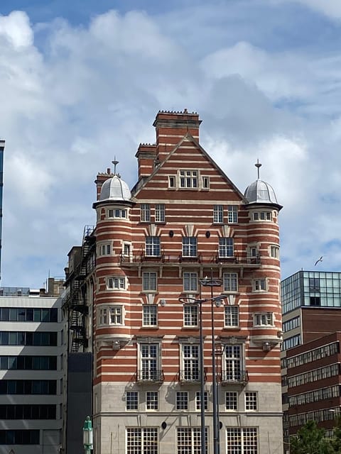 Liverpool: A Walk Through Time: Full History Walking Tour - Waterfront stops: connecting Old Dock history to the Royal Albert Dock
