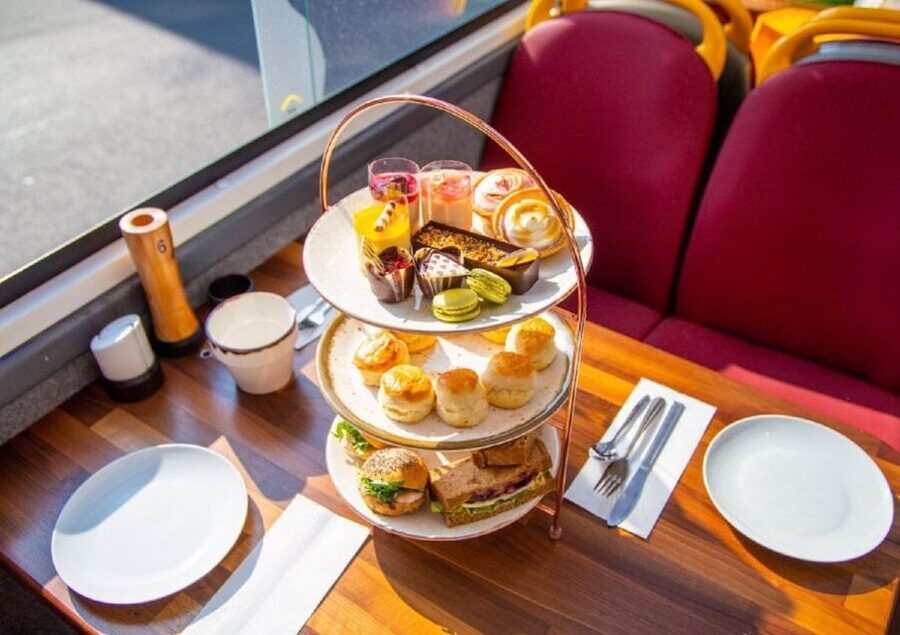 London: Afternoon Tea Bus with a Glass of Prosecco - Golden Tours Stop 1 to the best seats: upper vs lower deck