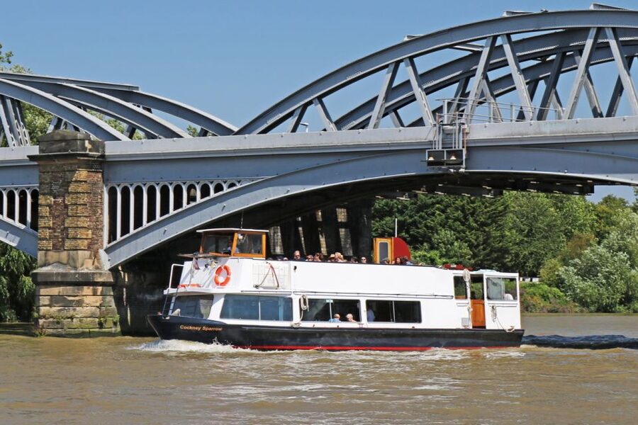 London: Westminster to Kew River Thames Cruise - Getting on board at Westminster Pier: seating, toilets, and the bar setup