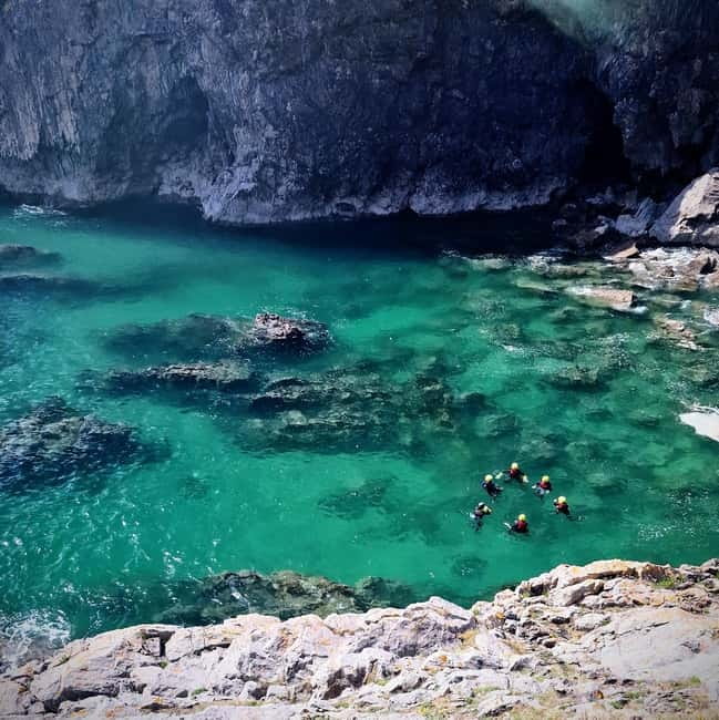 Tenby: Coasteering Adventure - Sea Caves, Secret Pools, and Optional Jumps You Control