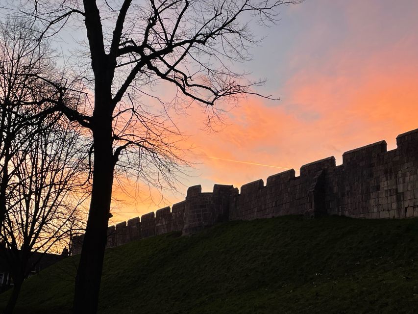 York: J&M’s City Sightseeing and History Walking Tour - Clifford’s Tower and the city walls climb: real defense, not just scenery